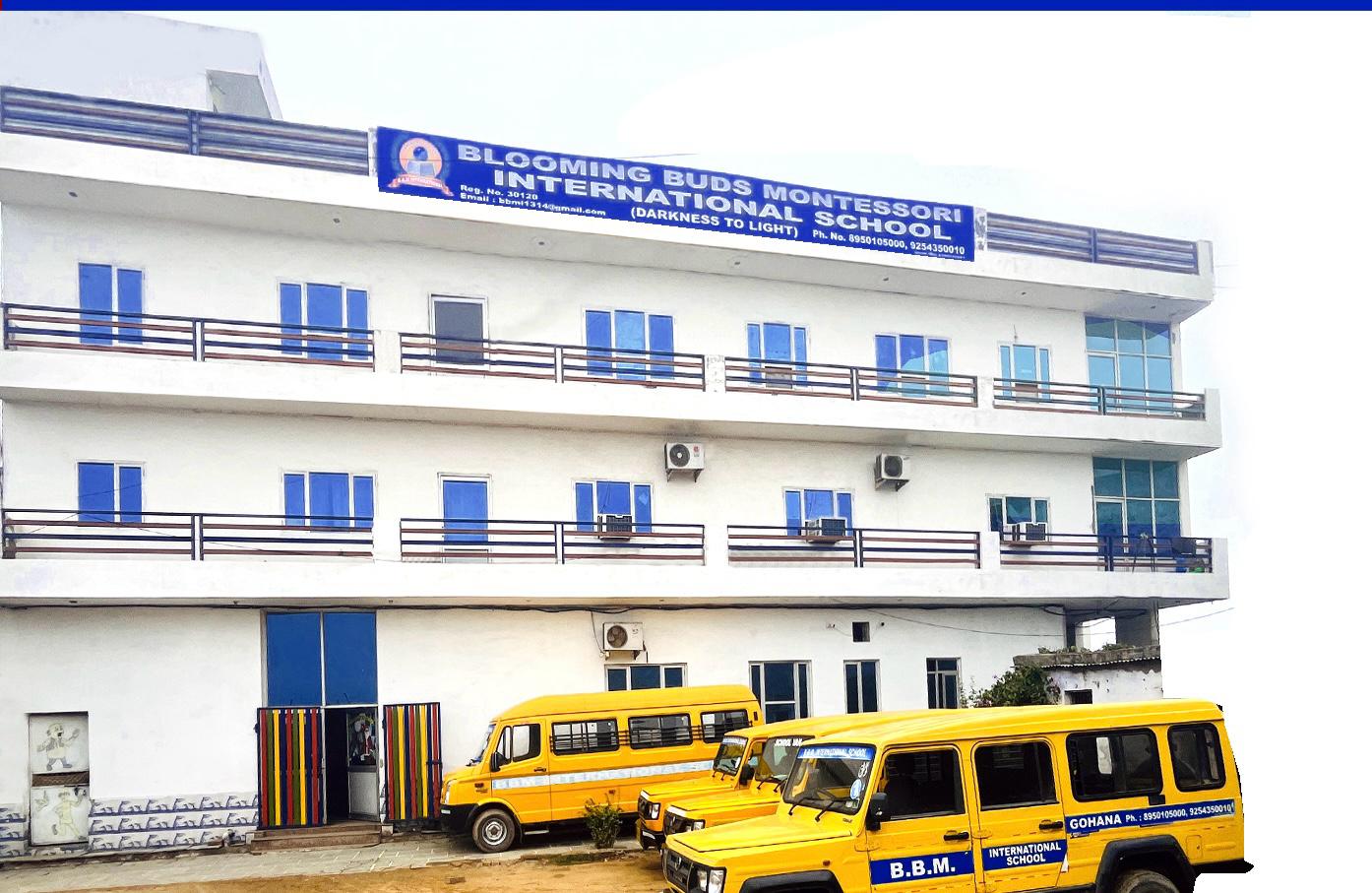 School building and buses
